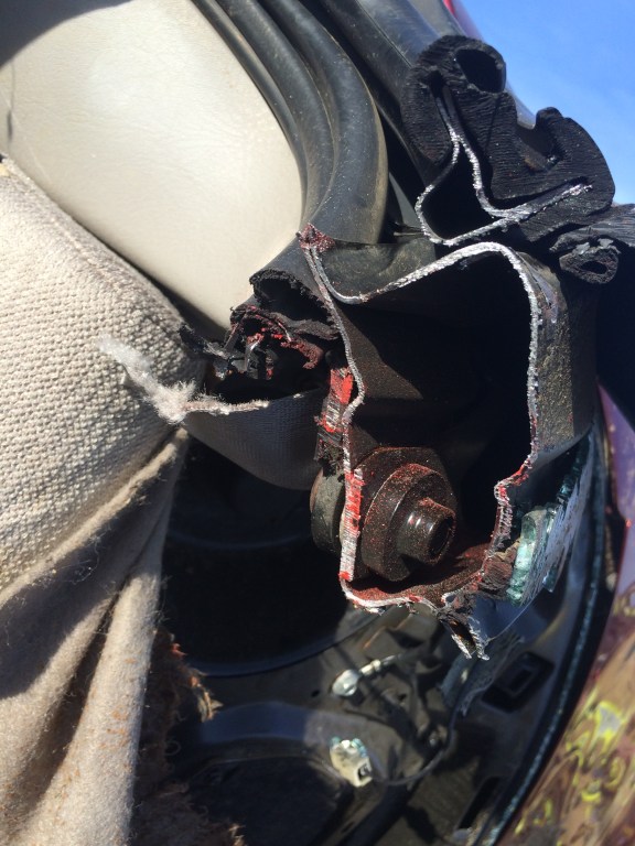 Weld-nut and Bolt on a grab handle (Location on the vehicle; A-Pillar)